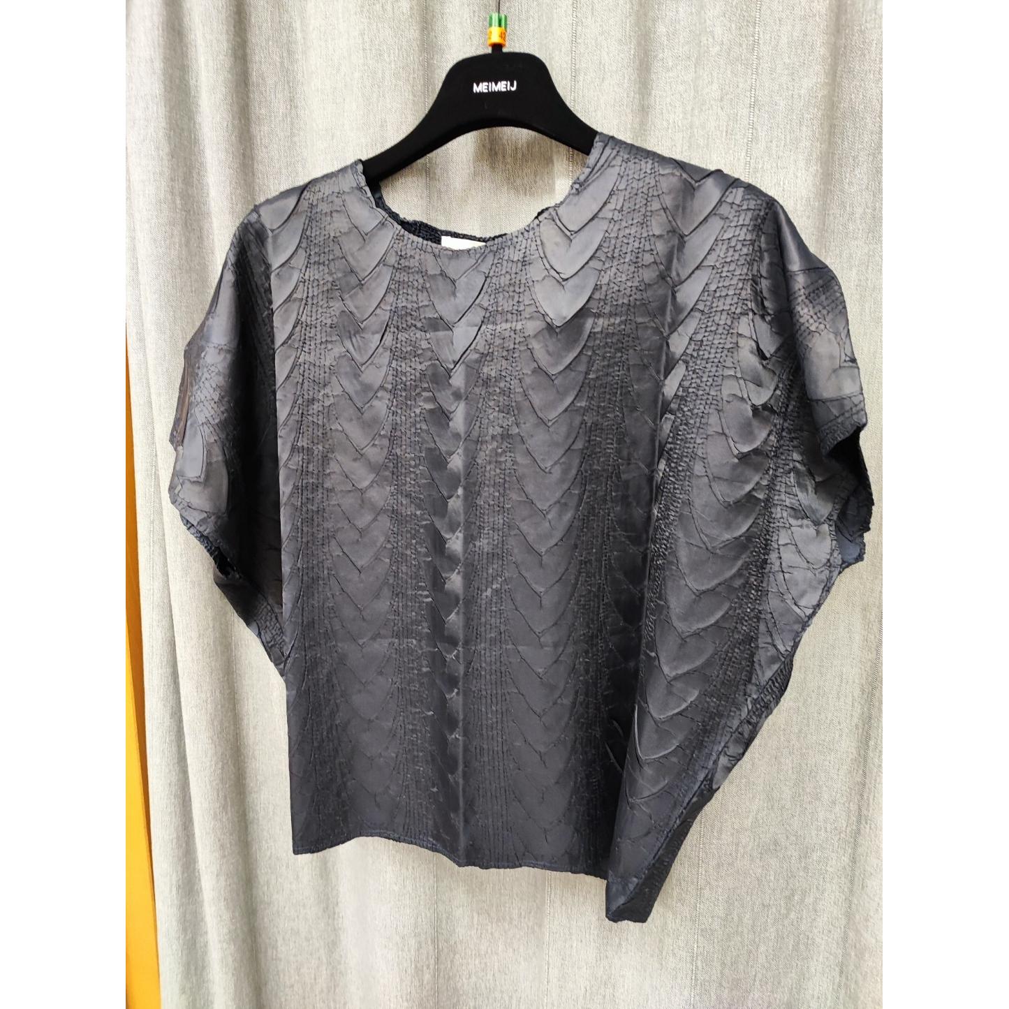 BLUSA PLISSETTATA DISEGNO TRECCIA