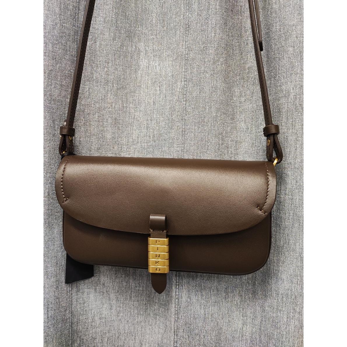 Borsa a spalla media Saddle Flat in pelle