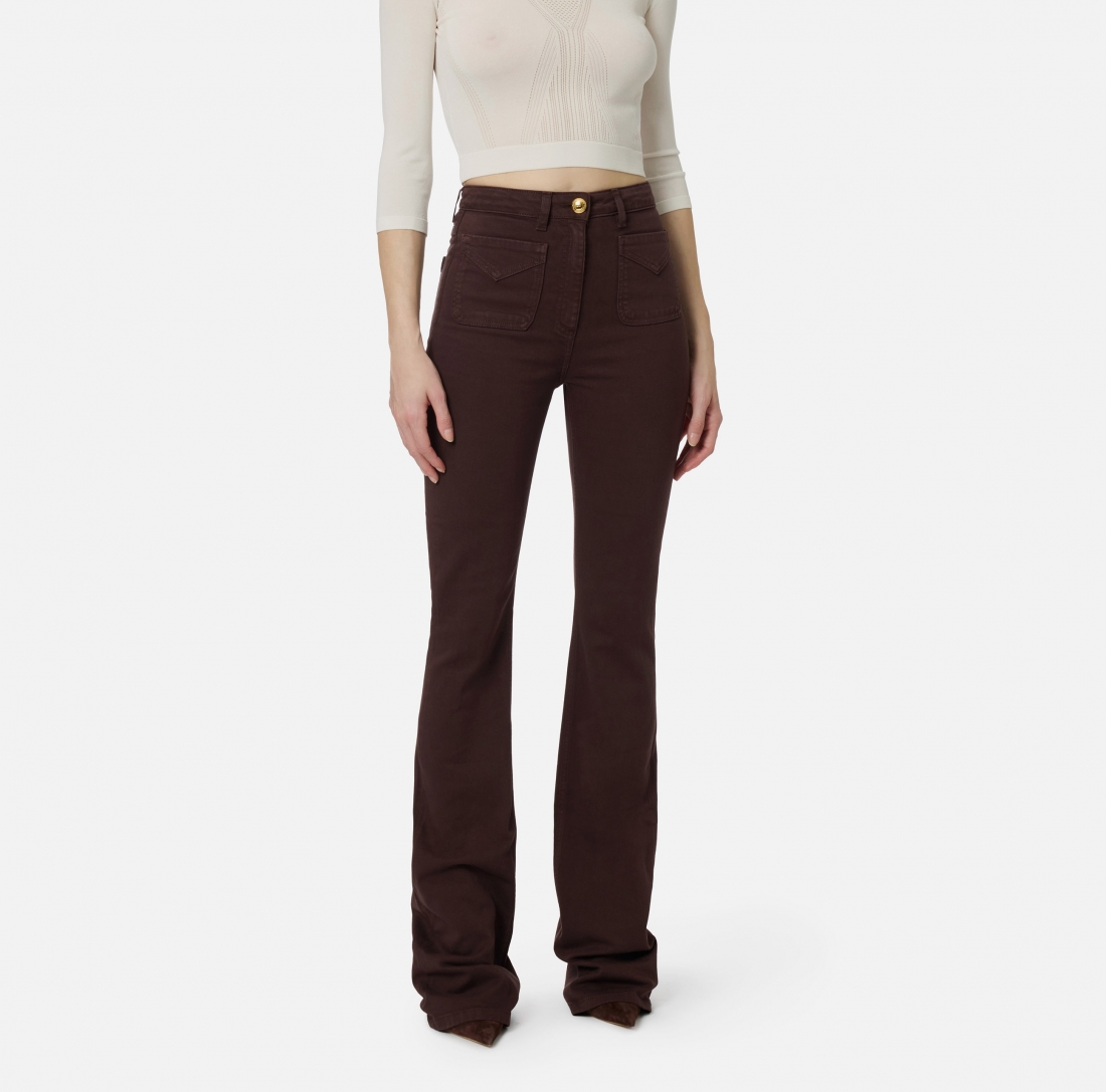 Jeans a zampa con taschini